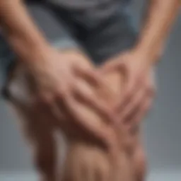 A person holding their knee in discomfort, illustrating joint pain in RA.